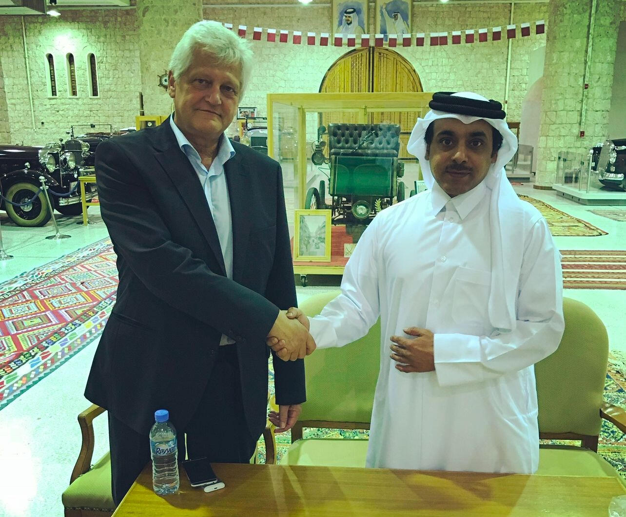 Dieter Wiesner and Sheikh Ahmed Al Thani handshake