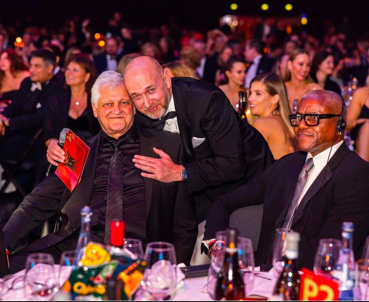 Dieter Wiesner sharing a moment at a Kinderlachen event