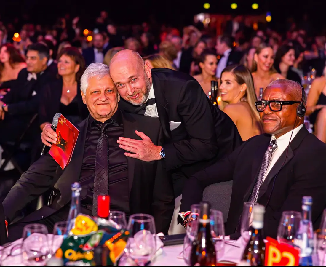 Dieter Wiesner sharing a moment at a Kinderlachen event